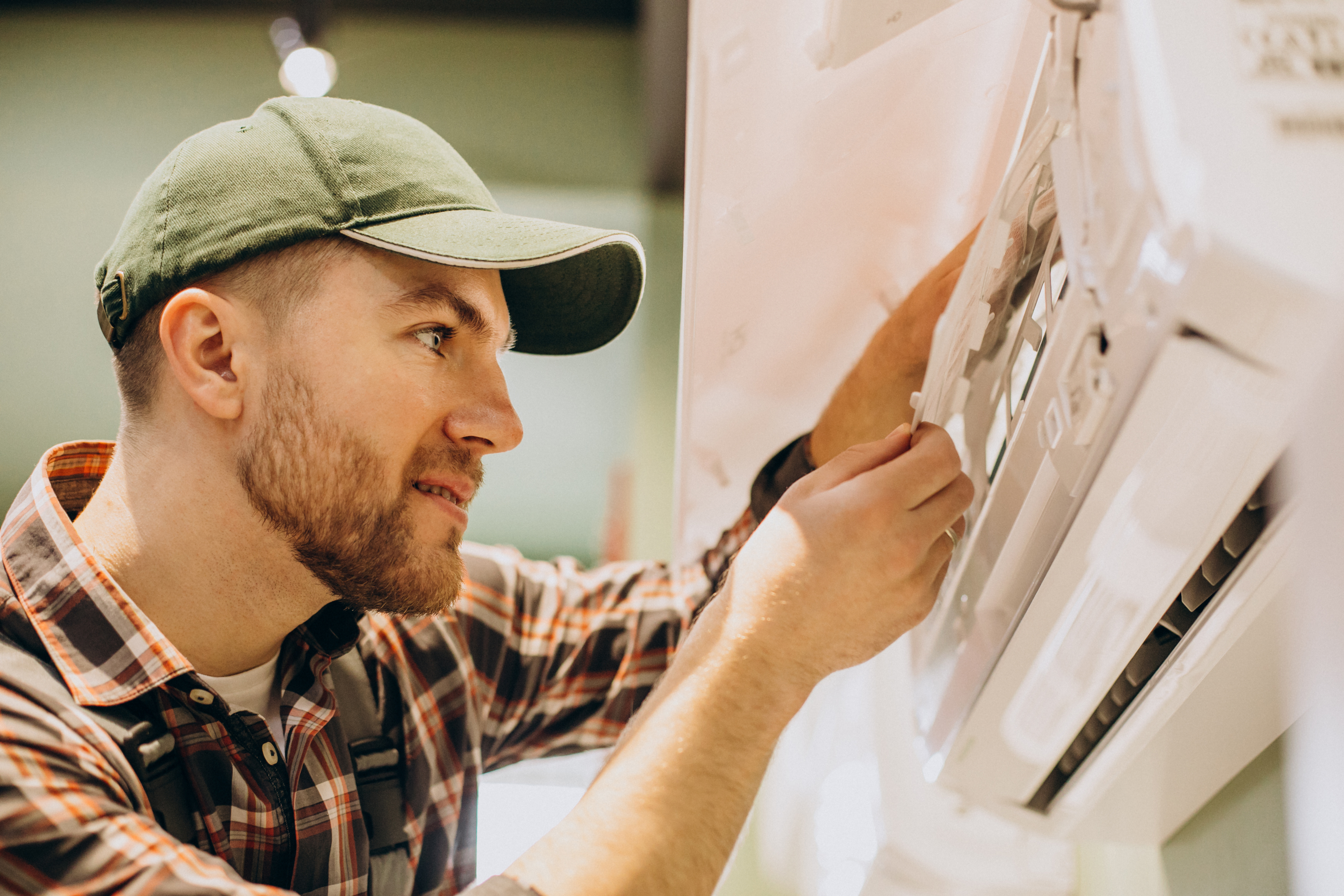 The Technical Services technician helping a customer with HVAC service